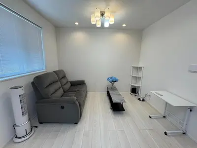 a living room with a couch and a desk at Nerima-ku - House - Vacation STAY 19929 in Tokyo