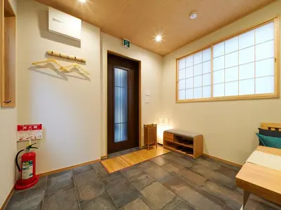 a room with a large window and a door at Yadoya Asakusa Asagao in Tokyo