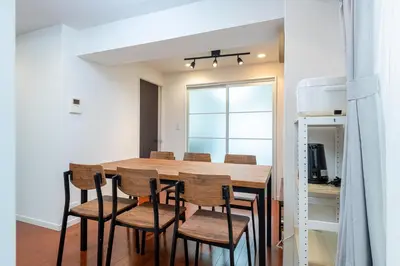 a kitchen and dining room with a table and chairs at \u30f4\u30a3\u30e9\u4ee3\u3005\u6728101 in Tokyo