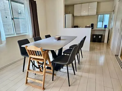a dining room with a table and chairs at Near Ikebukuro! 2min to Kita Ikebukuro Large House in Tokyo