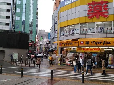 a group of people crossing a street in a city at M101 8mins from Ikebukuro sta 9min to Shinjuku byTrain in Tokyo