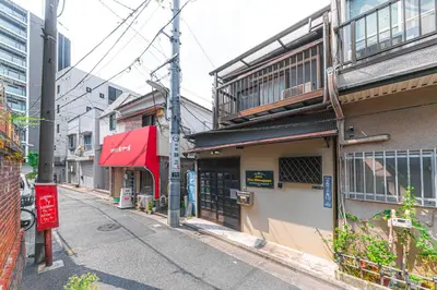 an empty street in a city with buildings at HOTEL Kita-Shinagawa in Tokyo