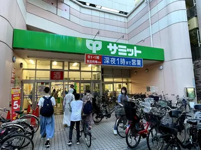 a group of people standing in front of a store at Ikebukuro area 6mins from sta Max6 2 bedrooms N202 in Tokyo