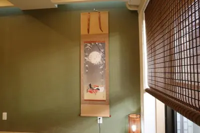 a painting on the wall of a room at Maple & Ginkgo Views Autumn Stay Up To 9 N201 in Tokyo