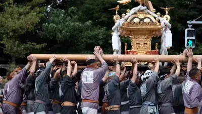 a group of men holding up a large pole at Maple & Ginkgo ViewsAutumn Stay Near Ikebukuro N105 in Tokyo