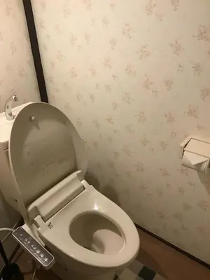 a bathroom with a white toilet in a room at Popular Direct from the airport, perfect for getting anywhere in Tokyo, Skytree, Asakusa's best access private lodging Lcuky Smile in Tokyo