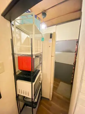 a room with a bunk bed and a ladder to a bunk bed at Popular Direct from the airport, perfect for getting anywhere in Tokyo, Skytree, Asakusa's best access private lodging Lcuky Smile in Tokyo