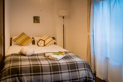 a bedroom with a bed with stuffed animals on it at Ikebukuro mansion,4-6people,two bedrooms,subway 5mins in Tokyo