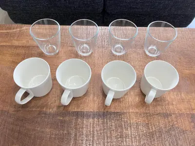 a bunch of empty wine glasses sitting on a table at KOU Jiyugaoka 202 in Tokyo