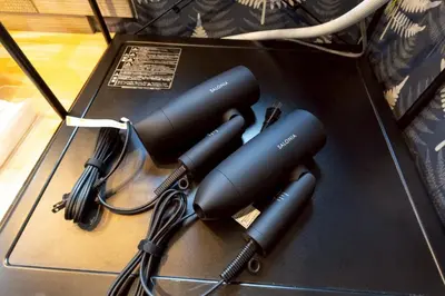 a group of three hair dryers sitting on a table at 3 minutes from Sangenjaya 90square meters 50square meters rooftop 3LDK Relaxing Tokyo stay with rooftop, jacuzzi projector in Tokyo