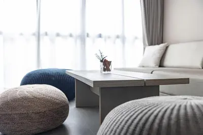 a living room with a coffee table and a couch at KOU Ikebukuro in Tokyo