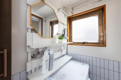 a bathroom with a sink and a mirror at LiveStay HIROO - 1BR and Cozy Living Area, 5th floor NO elevator, 34m2, 1-3 ppl, Hiroo Area, from Stn 10 min to Shibuya in Tokyo