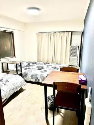 a bedroom with a bed and a desk and a table at Tokyo Shinjuku Nishi-Waseda House Station 2mins in Tokyo