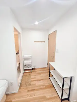 a white room with a mirror and a desk at 浅草花日美居 Asakusa Hanichi 206 Twin Bedroom Asakusa Temple 4 min walk Direct subway access to Narita and Haneda Airports Host's listings are all at the same address in Tokyo