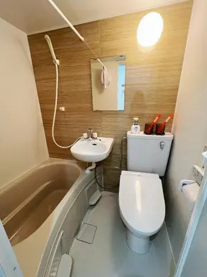 a small bathroom with a toilet and a sink at \u6d45\u8349\u82b1\u65e5\u7f8e\u5c45 Asakusa Hanahi 302 Twin Room 4 min walk to Sensoji Temple Direct access to Narita Haneda Airport in Tokyo