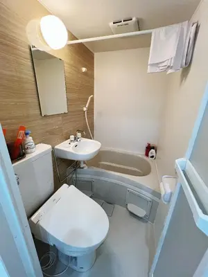 a bathroom with a toilet and a sink and a tub at \u6d45\u8349\u82b1\u65e5\u7f8e\u5c45 Asakusa Hanahi 305 Queen Bed Room, 4 min walk to Asakusa Temple, direct subway access to Narita and Haneda Airport in Tokyo