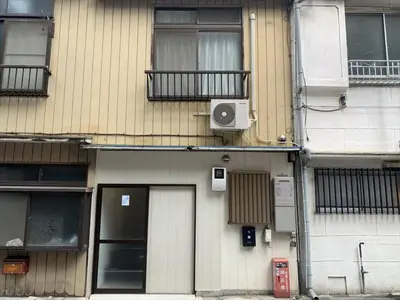 a building with a speaker on the side of it at Sogno House Tokyo Ueno in Tokyo
