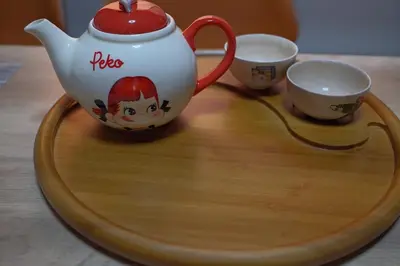 a tea pot and two cups on a wooden tray at 1 stop in Ikebukuro,Direct access to Shinjuku,Shibuya,Tokyo Station and Tokyo Dome,Japanese-style single-family house,2-story detached house,MAX7 in Tokyo