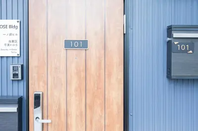 a wooden door with the number on it at Senzoku, Taito City 101-TT0305 in Tokyo
