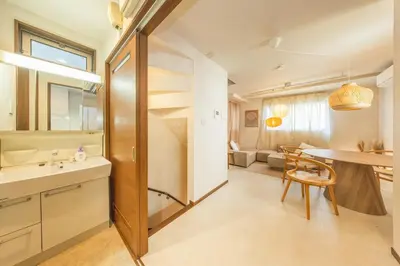 a large bathroom with a sink and a table at Wooden house max 8 people 7 minutes walk to Skytree 75 square meters in Tokyo