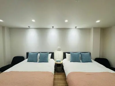 two beds sitting next to each other in a room at Senzoku, Taito City 201-TT0306 in Tokyo