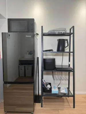 a shelf with a microwave and a refrigerator at Senzoku, Taito City 201-TT0306 in Tokyo