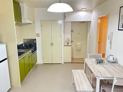 a kitchen with a table and a dining room at Ikebukuro\u4e2d\u5ddd4D-TS0035 in Tokyo
