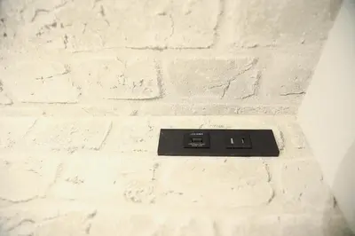 a brick wall with a black plate on it at WonderfulStayTOKYO Asakusa - Vacation STAY 68456v in Tokyo