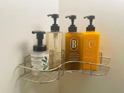 a shelf with three bottles ofodorizers on a wall at WonderfulStayTOKYO Asakusa - Vacation STAY 68456v in Tokyo