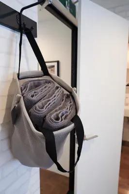 a bag hanging on a stand in front of a mirror at WonderfulStayTOKYO Asakusa - Vacation STAY 68456v in Tokyo