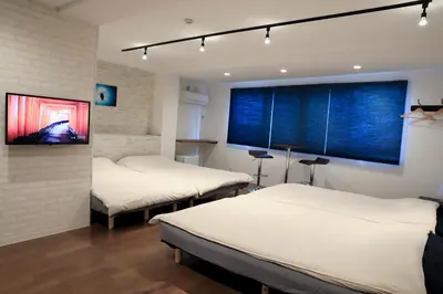 a room with two beds and a large window at WonderfulStayTOKYO Asakusa - Vacation STAY 68456v in Tokyo