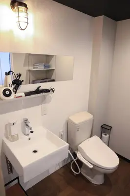 a bathroom with a white toilet and a sink at WonderfulStayTOKYO Asakusa - Vacation STAY 68472v in Tokyo