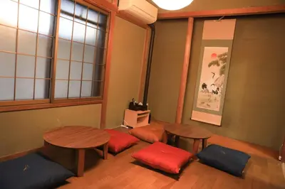 a room with two tables and chairs and a window at Wonderful stay TOKYO Asakusa - Vacation STAY 96514v in Tokyo