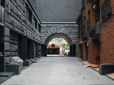 an alley way with an archway between two brick buildings at Sun Mall Crest 506 - Vacation STAY 19930 in Tokyo