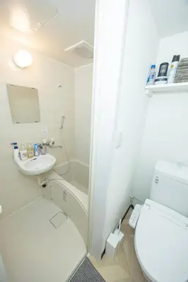 a bathroom with a toilet and a sink at Sugamo hotel 2F-TS0335 in Tokyo
