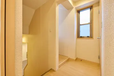 an empty hallway with a window and a door at Near Ueno House 7min Honkomagome 9min Sendagi in Tokyo