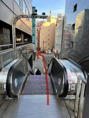 a set of two escalators in a city at Ueno358 in Tokyo