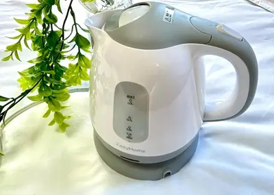 a tea kettle sitting on top of a table at Ueno358 in Tokyo