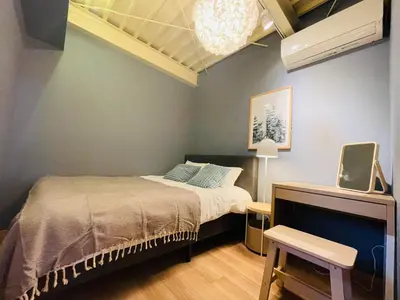 a small bedroom with a bed and a tv at Taito City, Higashiasakusa-3F-TT0304 in Tokyo