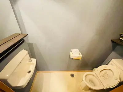 a small bathroom with a toilet and a sink at Taito City, Higashiasakusa-3F-TT0304 in Tokyo