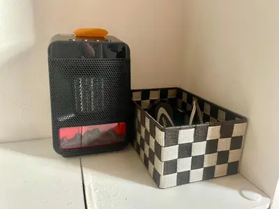 a container sitting on a counter next to a box at Meguro Sakura House close to Shibuya in Tokyo