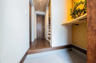 a hallway of a home with a staircase and a room at \u4eac\u6708Kyogetsu in Tokyo