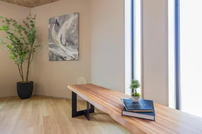 a wooden table with books on it in a room at \u4eac\u6708Kyogetsu in Tokyo