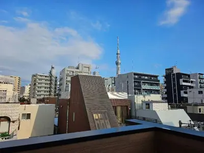 a view of a city skyline with buildings at Komorebi Rill \u6d45\u8349 in Tokyo