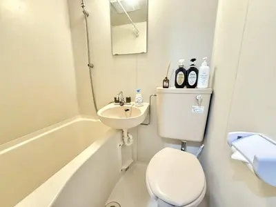 a small bathroom with a toilet and a sink at \u6c60\u888b Energy CA0 a9 in Tokyo