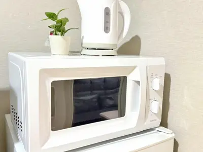 a microwave with a blender on top of it at \u6c60\u888b Energy CA0 a9 in Tokyo