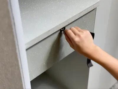 a person opening a door with a door knob at New Open 