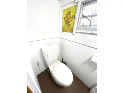 a white toilet in a bathroom with a window at Flower House - Vacation STAY 19340 in Tokyo