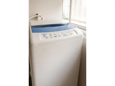 a washing machine with a sink on top of it at Flower House - Vacation STAY 19340 in Tokyo