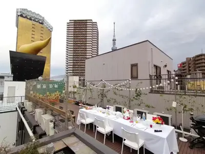 a table on the rooftop of a building at Tokyo Biyori Hotel - Vacation STAY 07403v in Tokyo